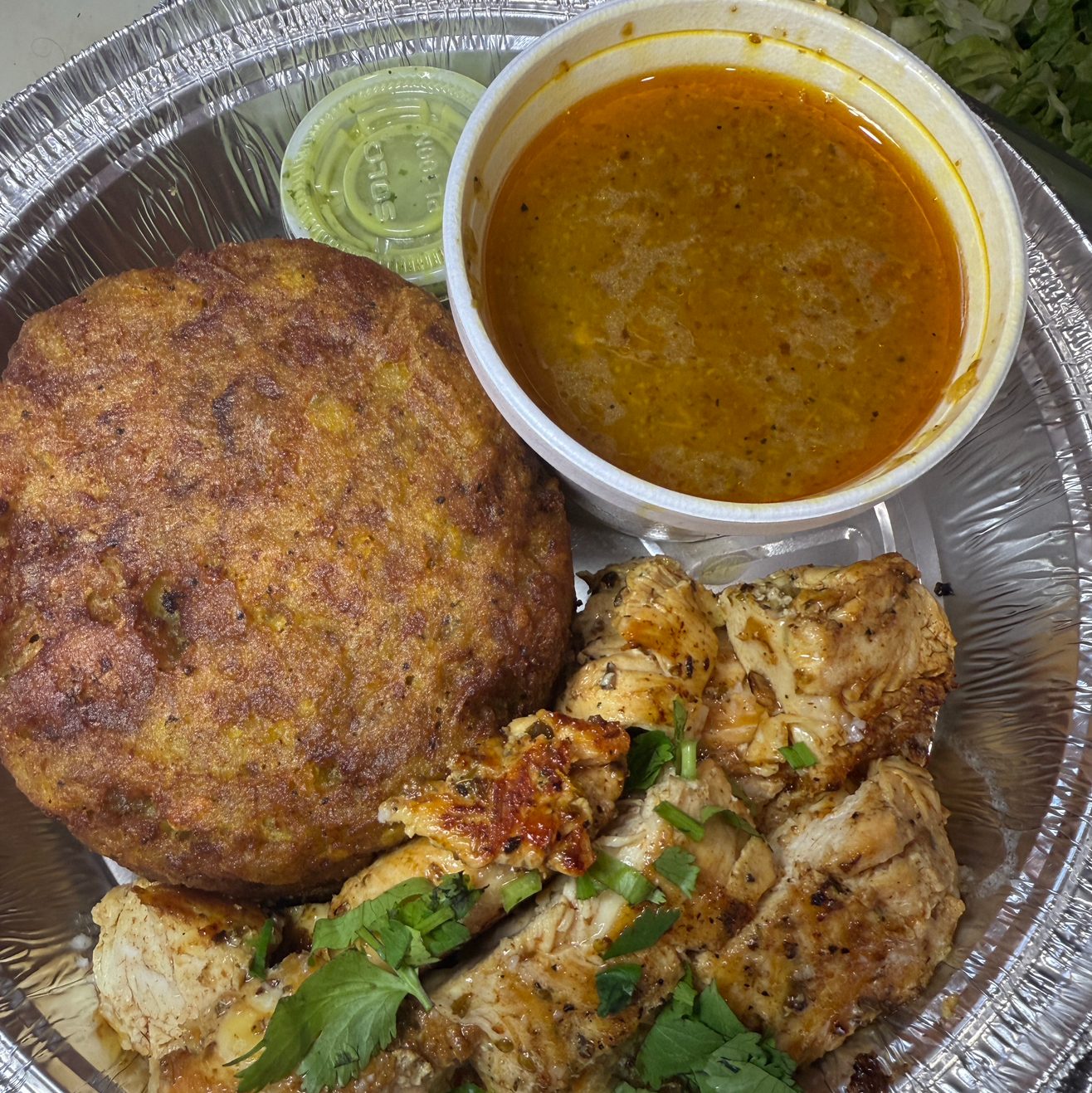 Grilled Chicken Stuffed Mangu Bola.